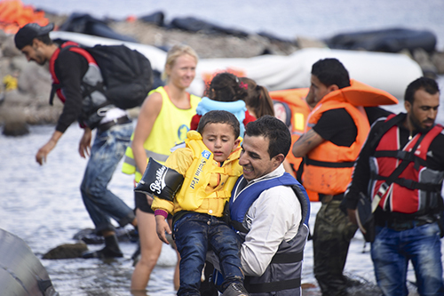 Syrian refugees arrive on Greek island of Lesbos, September 2015, Malcolm Chapman / Shutterstock.com
