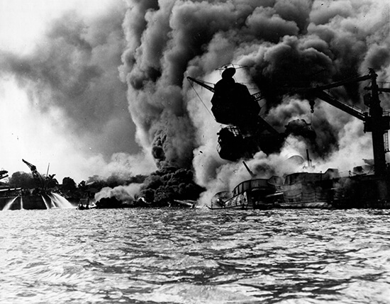 The battleship USS Arizona burning at Pearl Harbor, December 7, 1941