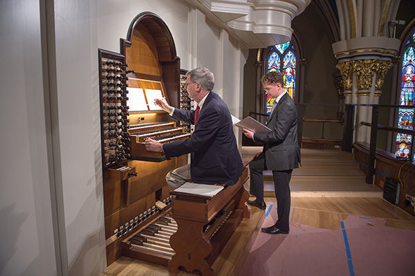 Professor Cramer and student Michael Plagerman are just two of the organists eager to get their hands and feet on the new instrument. photo: Barbara Johnston