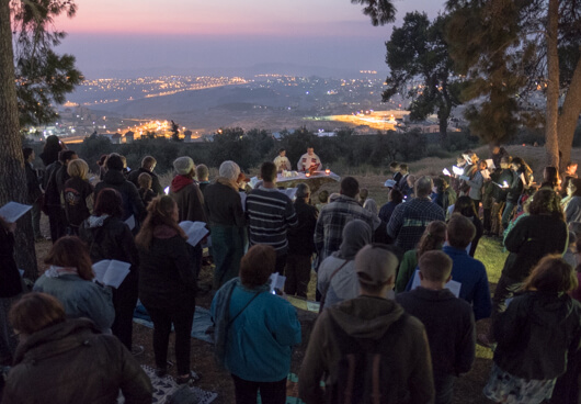 Pastors Carrie and Robert Smith lead an Easter sunrise service on the Mount of Olives for Redeemer Lutheran Church’s English-speaking congregation, photo by Ben Gray.