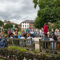 Tourists, including members of the Robinson Shakespeare Company, marveled at the mastery Shakespeare Birthplace actors Chris Dunford (arm raised, at left) and James Tanton (in red) displayed.