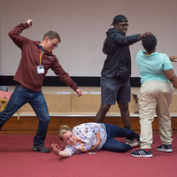 Scott Jackson of Shakespeare at Notre Dame and Robinson Shakespeare Company members Grace Lazarz, Josh Crudup and Christian Jackson create a tableau, a still image depicting part of a play, for Julius Caesar.