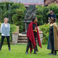 A visitor to Shakespeare's New Place photographs the Robinson Shakespeare Company's rehearsal of Cymbeline.