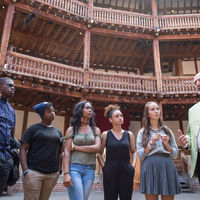 Notre Dame professor Peter Holland, a Shakespeare expert, speaks to members of the Robinson Shakespeare Company at the Globe Theatre in London.