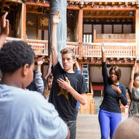 Robinson Shakespeare Company actors learn the principles of stage movement during a workshop at the Globe Theatre in London.