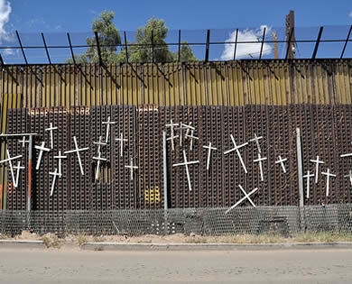 Crosses on the border wall at Nogales