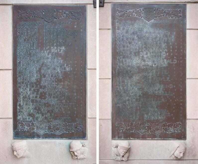 Two bronze plaques on doorposts at the Basilica of the Sacred Heart, commemorating World War I servicemembers from Notre Dame.