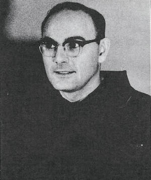 A black-and-white, circa 1960s yearbook photo of Father Blane O'Neill in his Franciscan habit