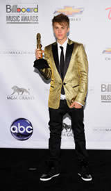 Justin Bieber photo by Kristian Dowling/Picturegroup via AP Images
