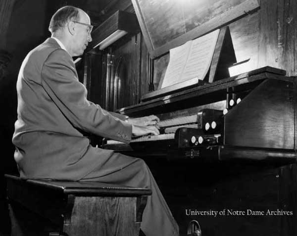 Professor Daniel H. Pedtke playing the organ in Sacred Heart Church Basilica, c1950s.