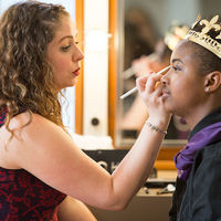 Attending the king: Director and, in this case, makeup artist Christy Burgess prepares Cameron Pierce for her role as King Cymbeline.