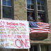 A student placed this bedsheet banner, with lyrics from a U-2 song, in a Breen-Phillips window on Sept. 11. It was one of the first public signs of grief and loyalty on the ND campus.