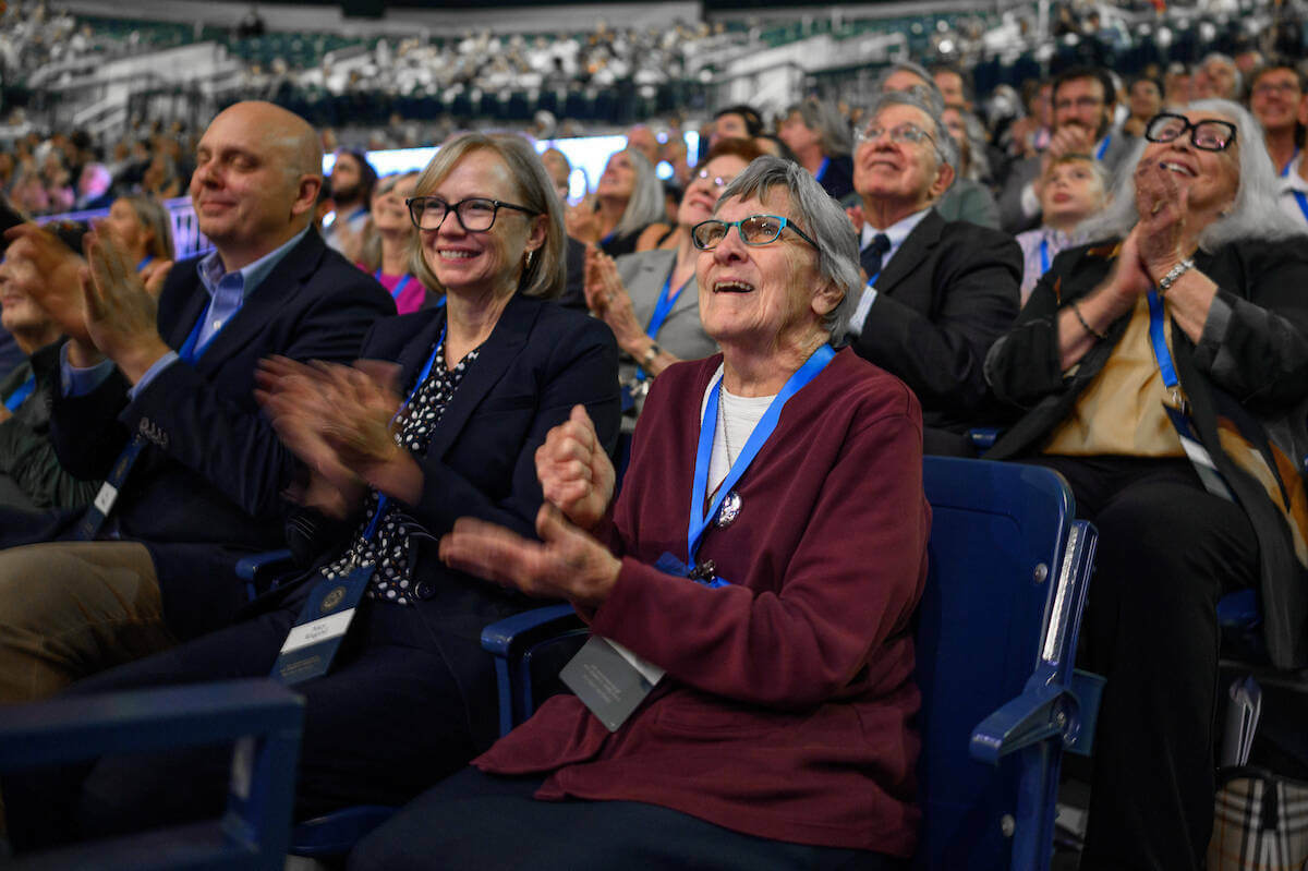 Sister Carmel Marie Sallows reacts as Rev. Robert A. Dowd recognizes her impact on his life as his first-grade teacher