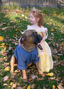 Daughter and dog, both ready for Halloween